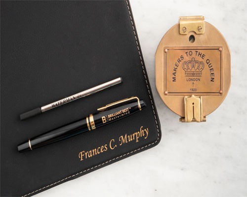 Laser engraving on business pen & pen pad Laser engraving on business pen & pen pad